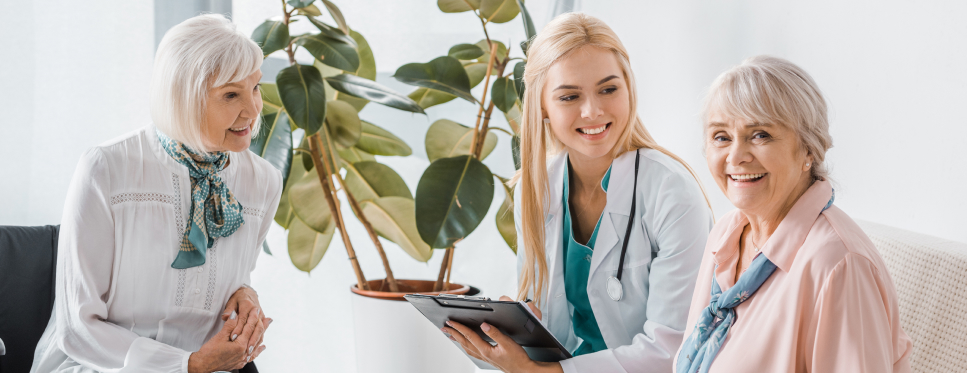 Doctor meeting with two patients